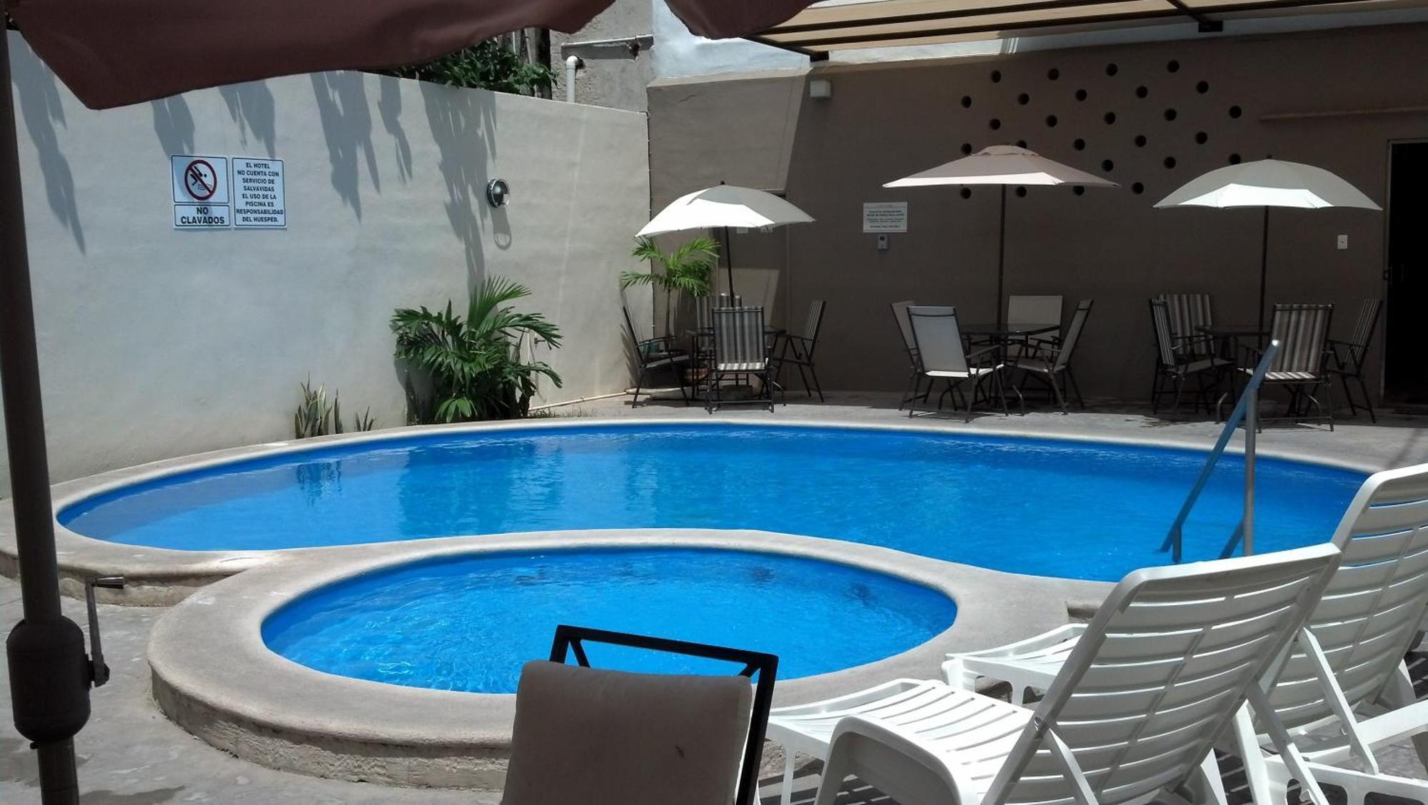 Hotel & Suites Domani Progreso  Rum bild